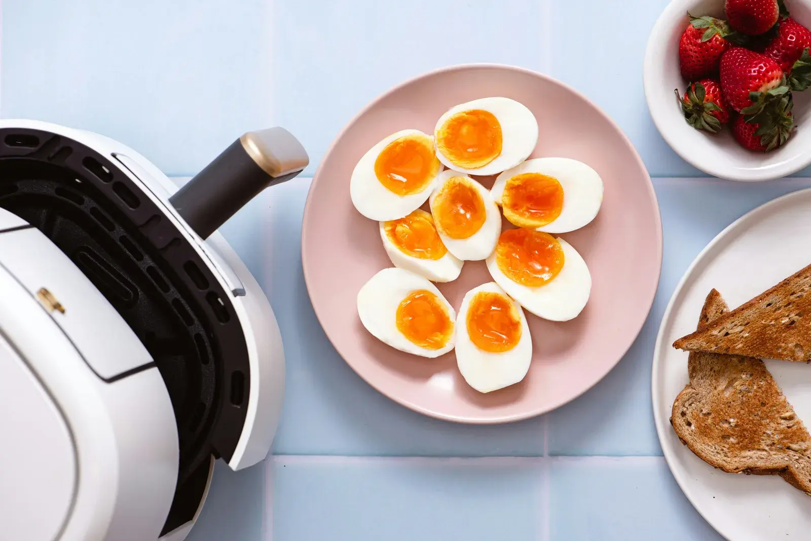 Boiled eggs halved on a plate