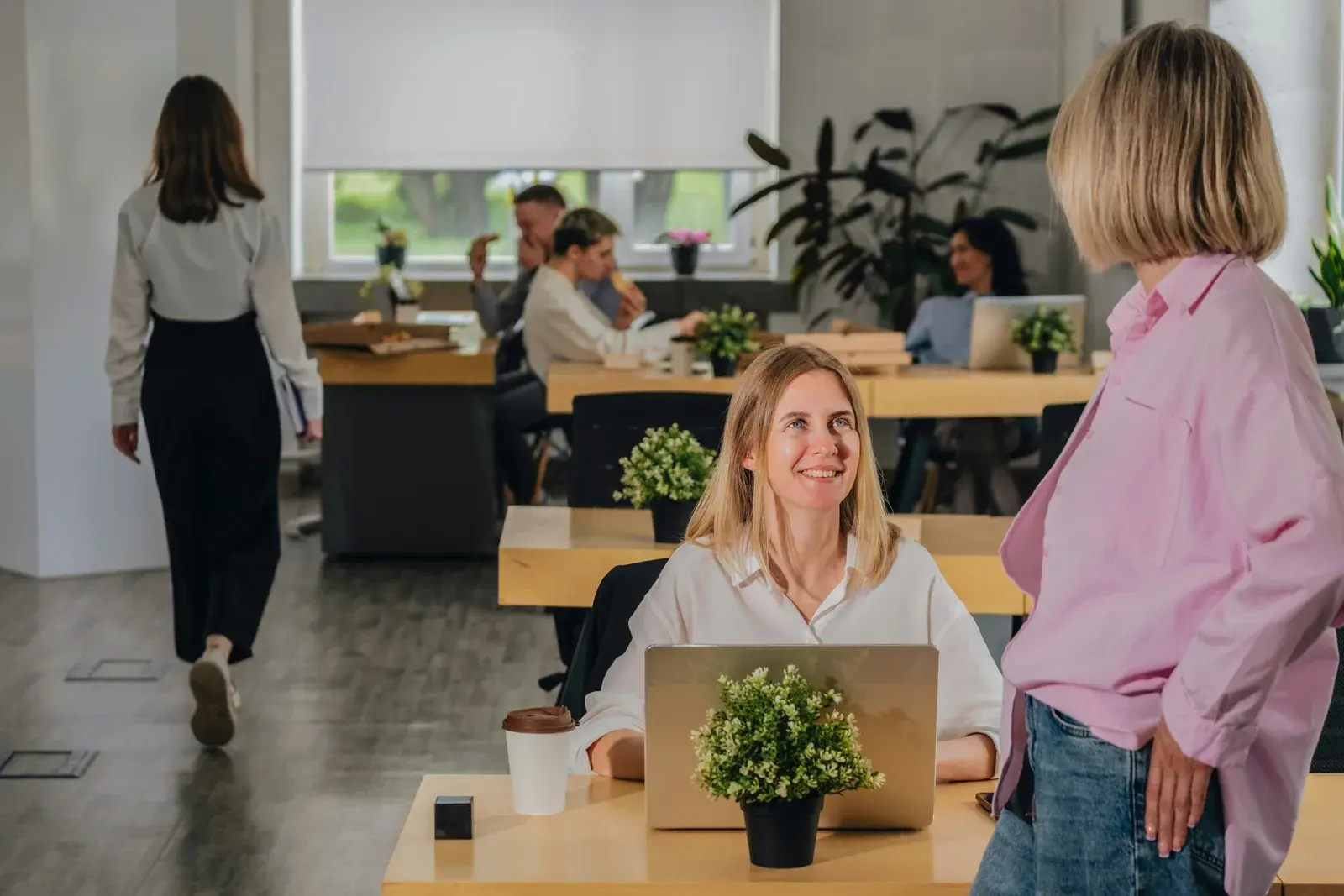 Women in an office smiling